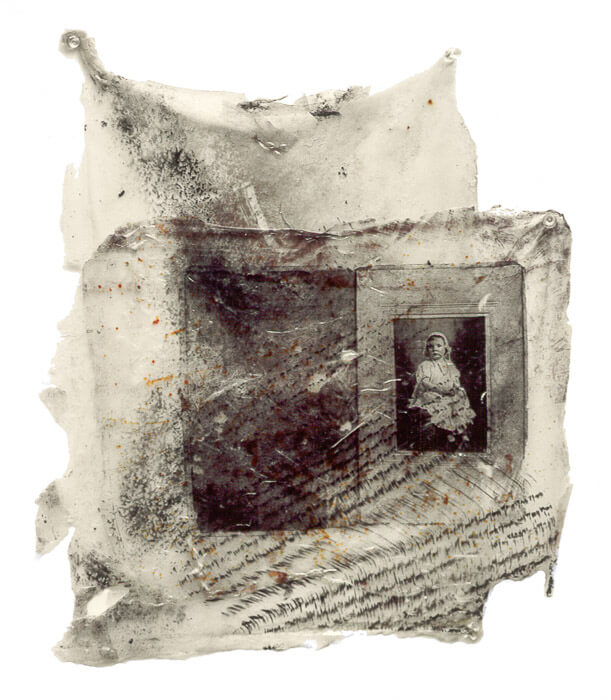 artwork with rust, carbon and an image transfer of a child (from an antique photo) embedded in skins of acrylic polymers