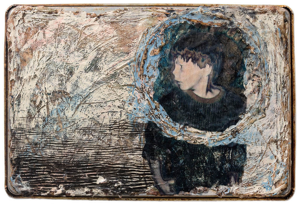 heavily textured mixed media art on metal, image of a boy with head encircled