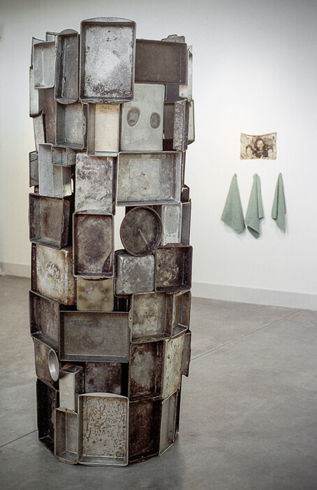 Installation View, a sculpture made of bakeware mainly pans by Sally Mankus