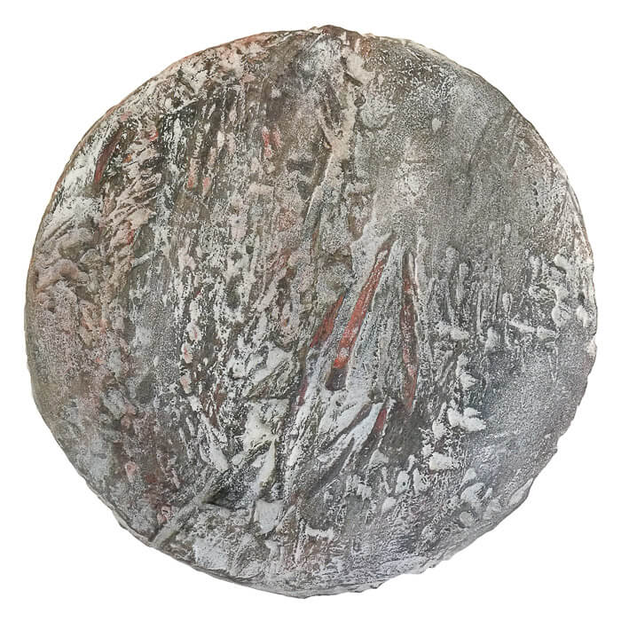 heavily texture art on round metal