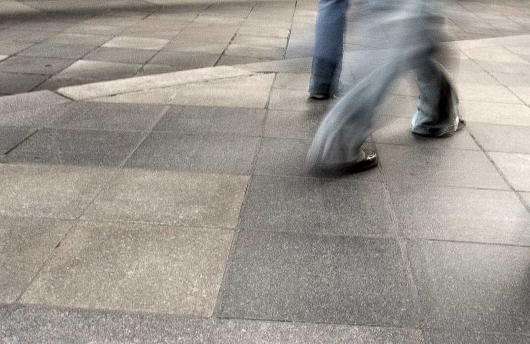 feet of people walking, motion blur