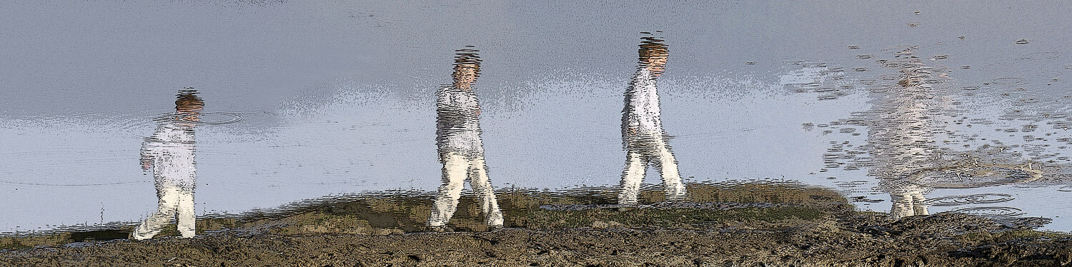water reflections of a boy walking, manipulated-photography